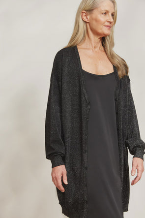 Rain, wind or shine, you can always count on the Lujo Cardigan to keep you cosy and stylish. It's got everything you need, from the button-down front to the long sleeves and knee-length design, all in an ultra-soft, relaxed fit. The subtle lurex threading adds a shimmer to your look, making you feel like a shining star wherever you go! Throw it over a tank and your favourite denim to create an effortless look.