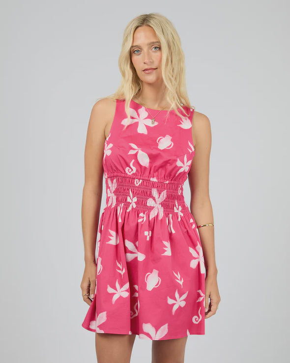 Eye-catching statement floral print

Ruching around the waist for a flattering silhouette

Adjustable tie fastening at the back of the neck

High neckline for a chic, modern look

Mini length — perfect for warm-weather days

Soft, breathable fabric with a little stretch

Fabric composition: 98% Cotton, 2% Elastane