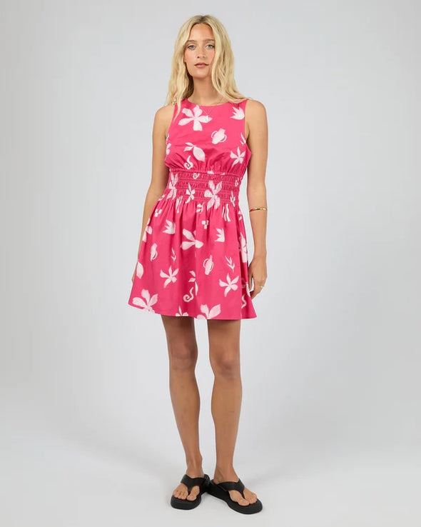 Eye-catching statement floral print

Ruching around the waist for a flattering silhouette

Adjustable tie fastening at the back of the neck

High neckline for a chic, modern look

Mini length — perfect for warm-weather days

Soft, breathable fabric with a little stretch

Fabric composition: 98% Cotton, 2% Elastane
