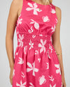 Eye-catching statement floral print

Ruching around the waist for a flattering silhouette

Adjustable tie fastening at the back of the neck

High neckline for a chic, modern look

Mini length — perfect for warm-weather days

Soft, breathable fabric with a little stretch

Fabric composition: 98% Cotton, 2% Elastane