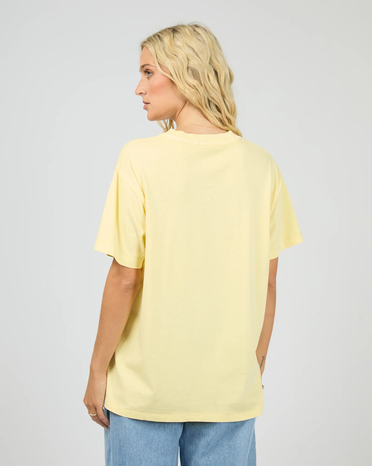 Introducing the Pippa Relaxed Tee in Yellow, designed to add a subtle pop of yellow to your wardrobe. Crafted from cotton, it features a relaxed fit silhouette with an All About Eve exclusive cherry graphic, delivering comfort and effortless wear. Style it casually for brunch with the girls, or pair it back with your favourite denim jeans for relaxed family gatherings.