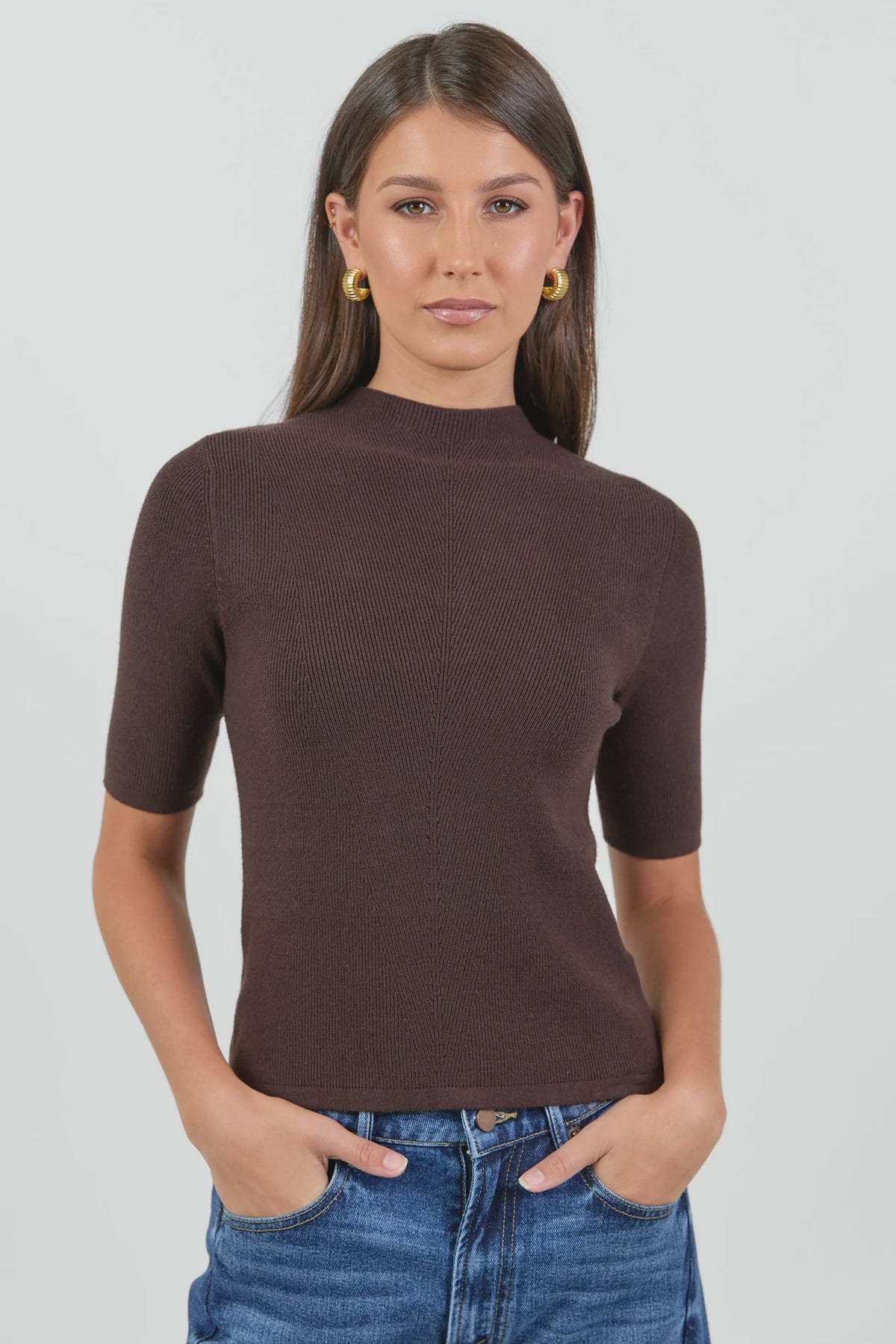 Soft rib knit texture
Flattering fitted silhouette
Comfortable stretch for ease of wear
Short sleeves
Lightweight feel for year-round styling
Fabric Composition: 51% Viscose, 28% Polyester, 21% Nylon
Delicate garment, handle with care