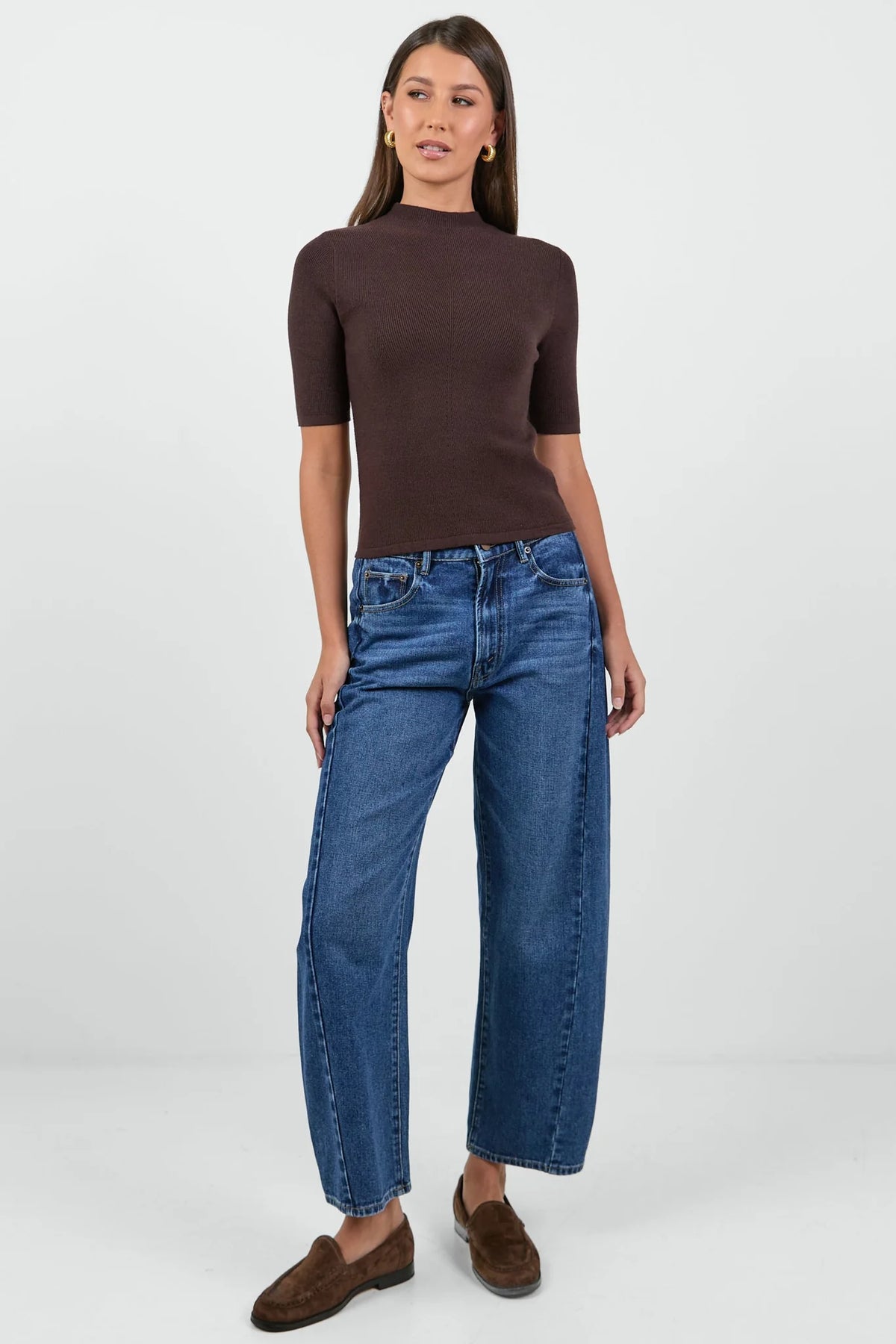 Soft rib knit texture
Flattering fitted silhouette
Comfortable stretch for ease of wear
Short sleeves
Lightweight feel for year-round styling
Fabric Composition: 51% Viscose, 28% Polyester, 21% Nylon
Delicate garment, handle with care