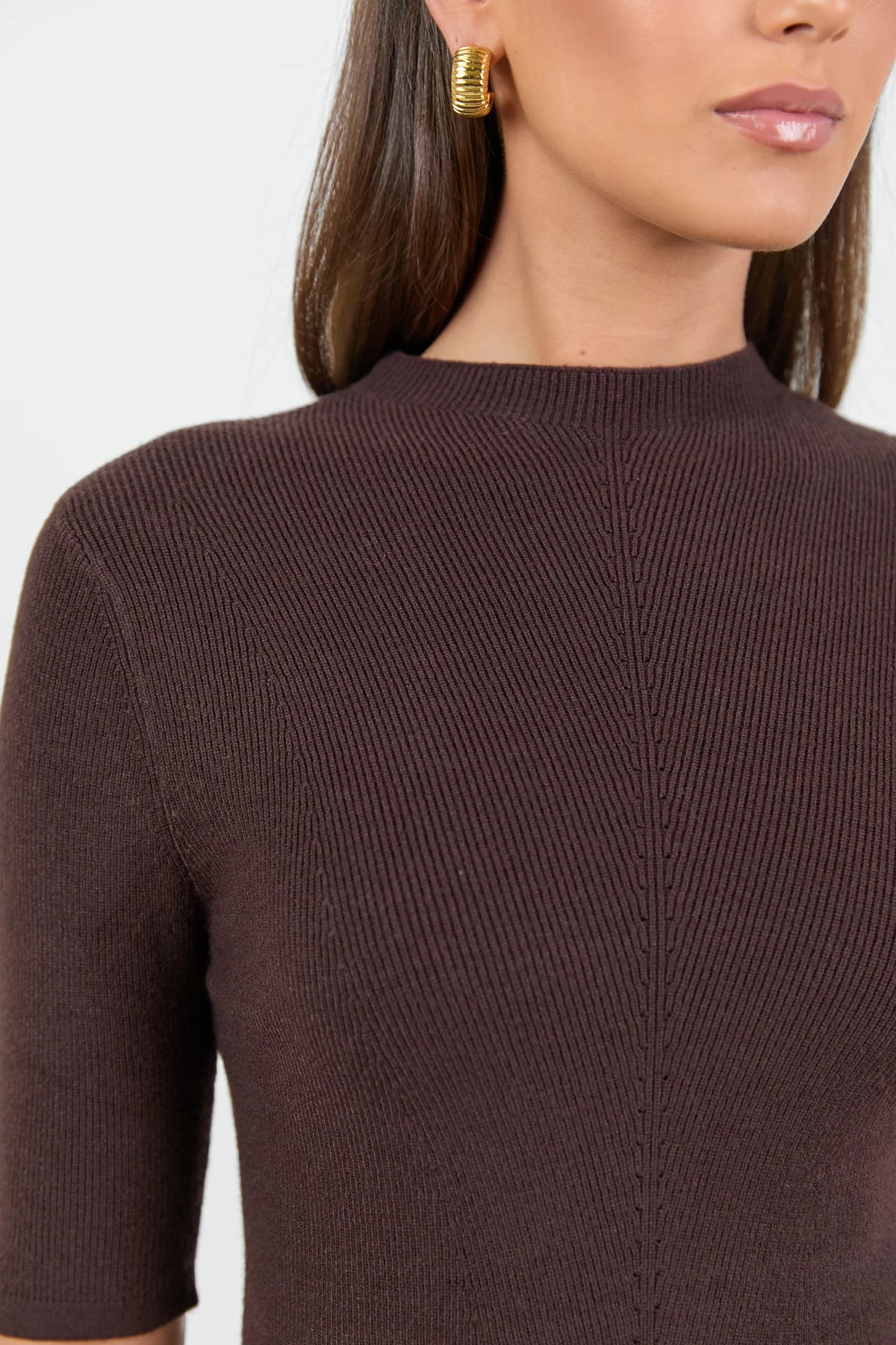 Soft rib knit texture
Flattering fitted silhouette
Comfortable stretch for ease of wear
Short sleeves
Lightweight feel for year-round styling
Fabric Composition: 51% Viscose, 28% Polyester, 21% Nylon
Delicate garment, handle with care