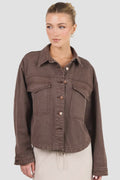 - Long sleeve relaxed silhouette
- Button front closure with contrast stitching
- Patch pockets for a utility inspired finish
- Full length hem, ideal for layering
- Fabric composition: 100% cotton
