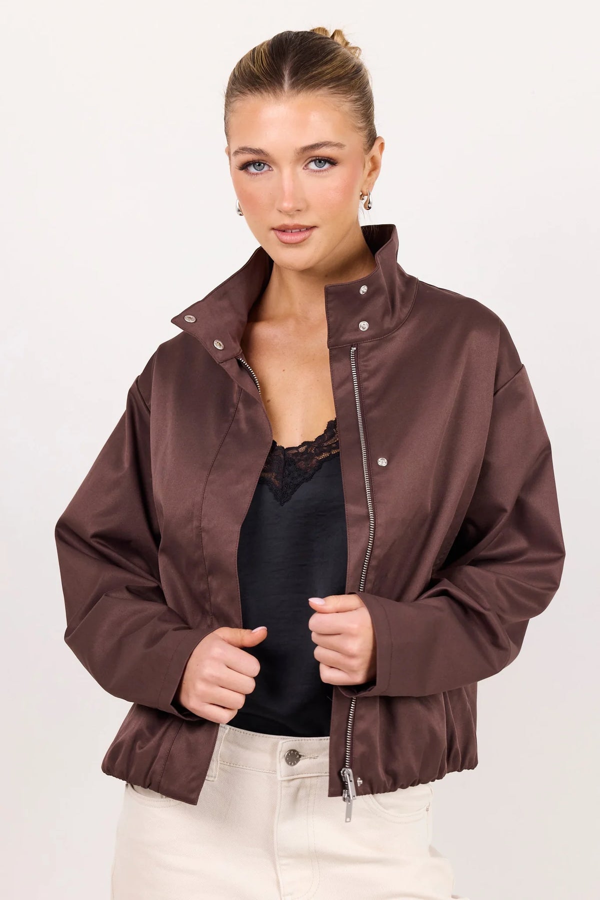 - Funnel neckline
- Long sleeves
- Concealed front fastening
- Relaxed oversized fit
- Side pockets
- Cropped length
- Fabric Composition - 100% Polyester