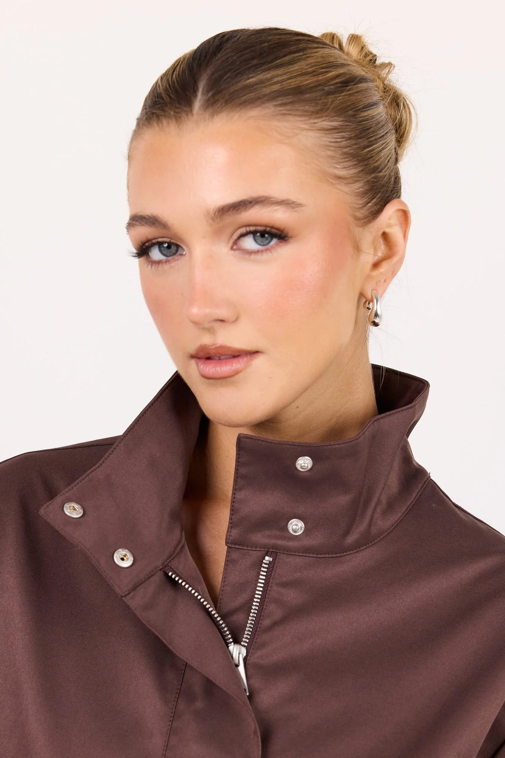 - Funnel neckline
- Long sleeves
- Concealed front fastening
- Relaxed oversized fit
- Side pockets
- Cropped length
- Fabric Composition - 100% Polyester