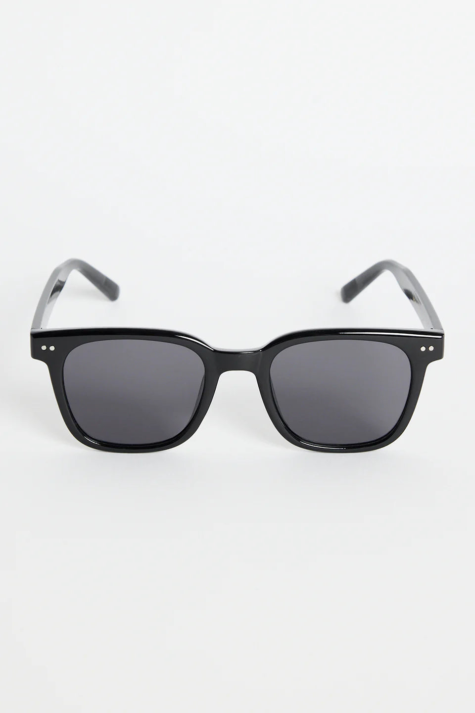 The Monaco Black Classic Sunglasses deliver clean, timeless style with a modern edge. Designed with a sleek black frame and softly rounded square lenses, they offer an effortless, everyday fit that works with absolutely everything. Subtle metal detailing adds a refined touch while the dark lenses keep the look sharp and versatile.

A classic staple made for sunshine, city strolls, and easy weekend wear