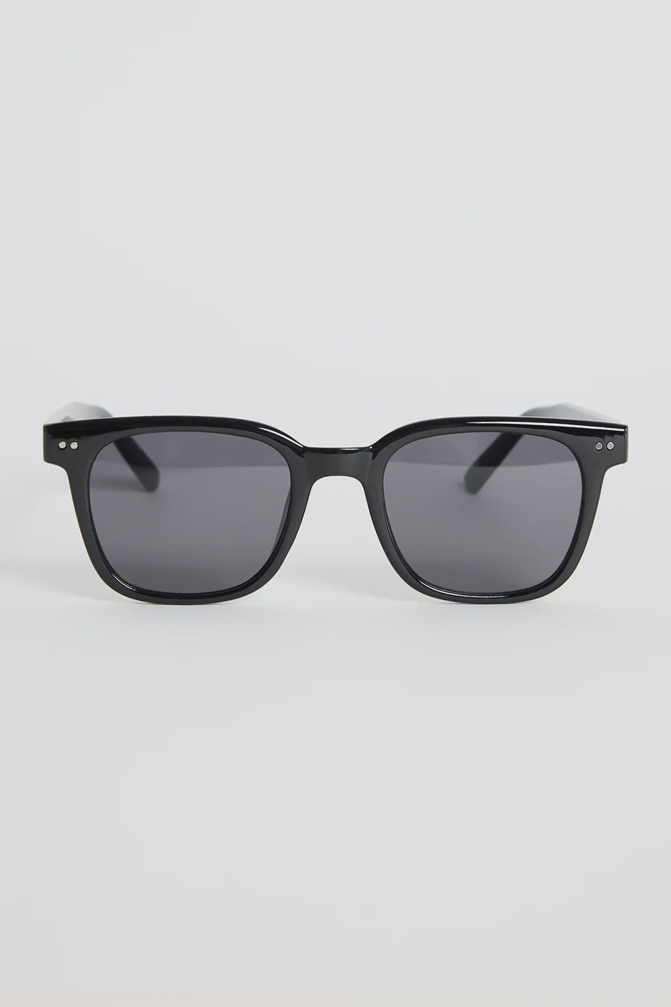 The Monaco Black Classic Sunglasses deliver clean, timeless style with a modern edge. Designed with a sleek black frame and softly rounded square lenses, they offer an effortless, everyday fit that works with absolutely everything. Subtle metal detailing adds a refined touch while the dark lenses keep the look sharp and versatile.

A classic staple made for sunshine, city strolls, and easy weekend wear