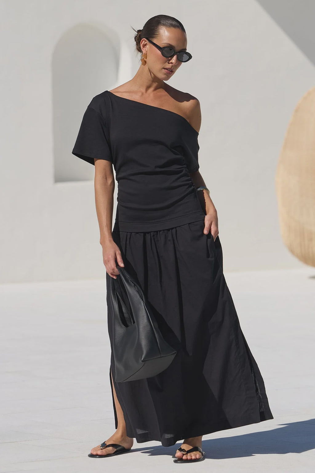 - Asymmetric off-shoulder neckline
- Short sleeves
- Fitted through the waist
- Softly gathered maxi skirt
- Pull-on design
- Natural fibre
- Fabric Composition - 100% Cotton