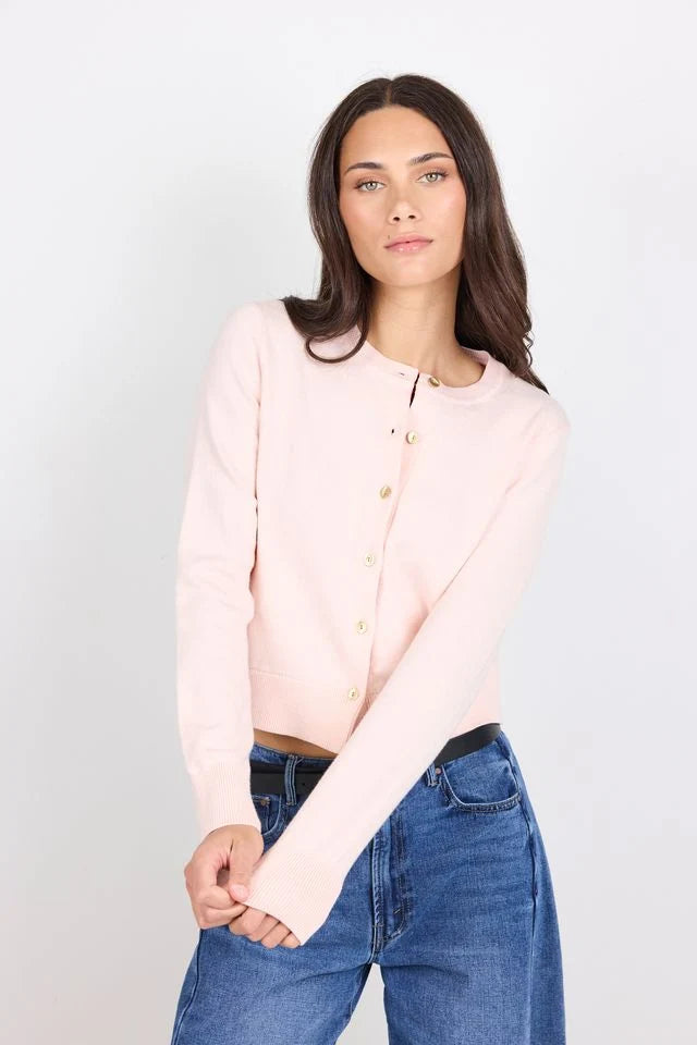Classic crew neckline

Short sleeves for everyday ease

All-over shirred bodice for a flattering fit

Soft peplum hem adds feminine shape

Easy pull-on design

Made from natural fibres

