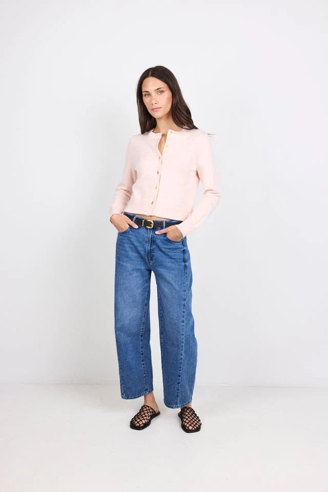 Classic crew neckline

Short sleeves for everyday ease

All-over shirred bodice for a flattering fit

Soft peplum hem adds feminine shape

Easy pull-on design

Made from natural fibres

