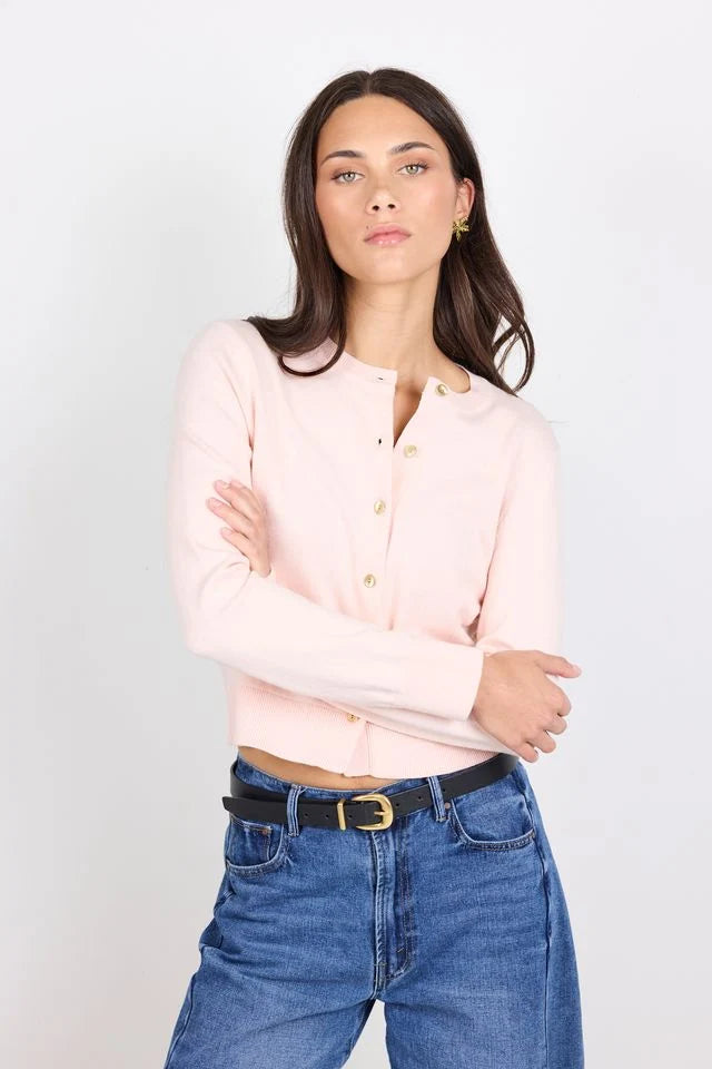 Classic crew neckline

Short sleeves for everyday ease

All-over shirred bodice for a flattering fit

Soft peplum hem adds feminine shape

Easy pull-on design

Made from natural fibres
