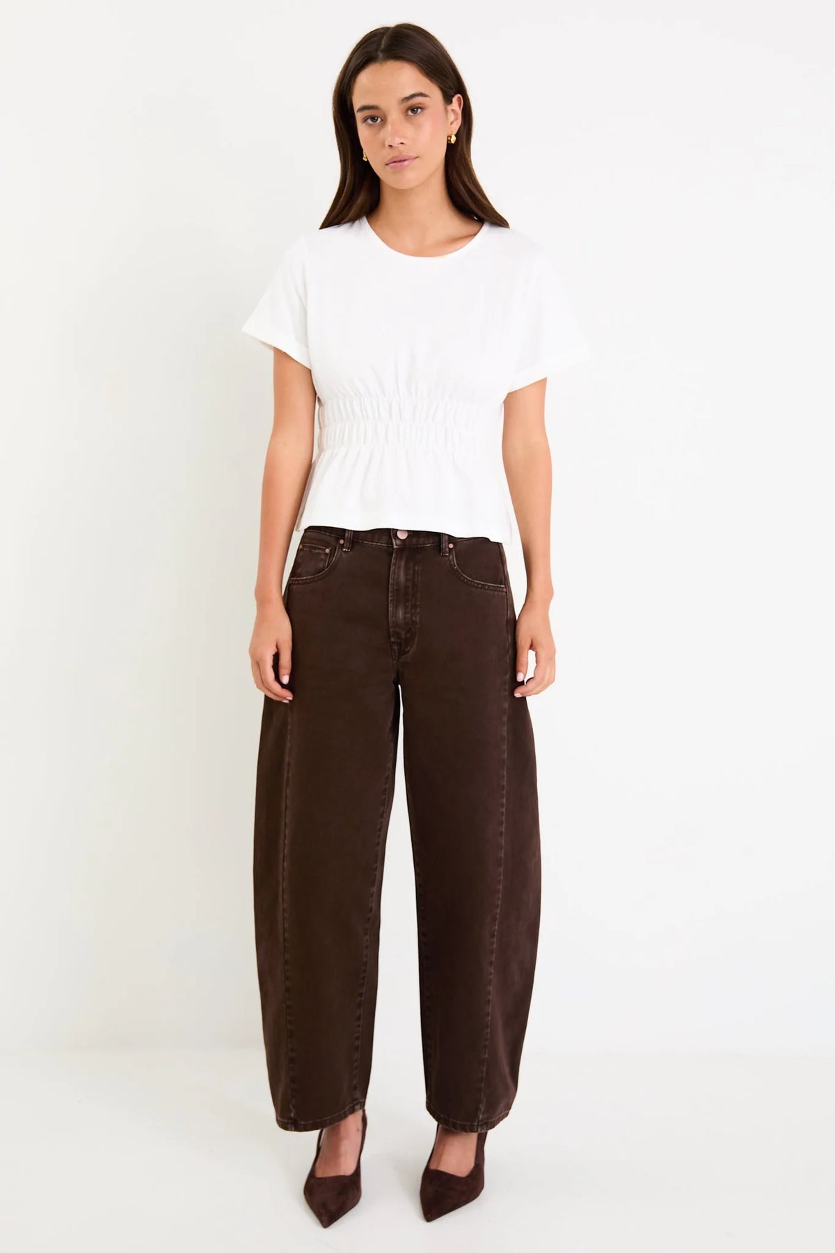 Classic crew neckline for timeless style

Short sleeves with rolled cuffs

Shirred waist detail for a flattering, tailored fit

Flared peplum-style hem for feminine movement

Made from soft, breathable 100% cotton