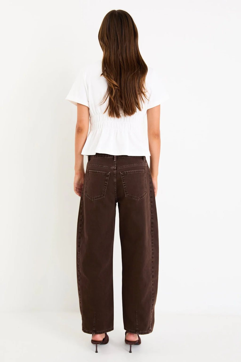 Classic crew neckline for timeless style

Short sleeves with rolled cuffs

Shirred waist detail for a flattering, tailored fit

Flared peplum-style hem for feminine movement

Made from soft, breathable 100% cotton