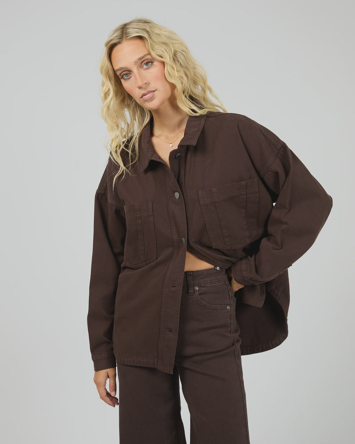 Chest pockets
Functional buttons
Cotton rigid denim
100% Cotton
Model is wearing a size 8