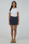 Mid-rise waist for a flattering everyday fit

Crafted from rigid 100% cotton denim

Mini length with hidden skort detail for added coverage

Functional front and back pockets

Stitched hem for a clean, structured finish

Shank button closure for a classic denim look

Vintage wash for an effortlessly cool feel