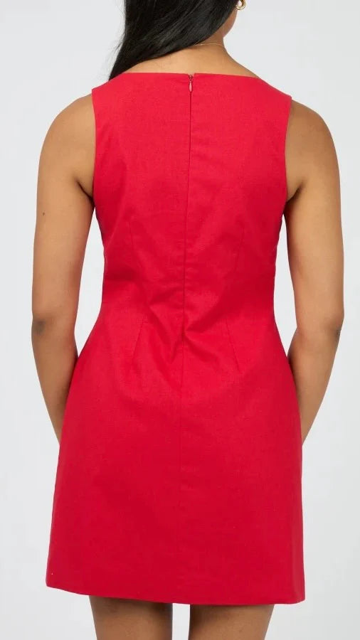 Mini length for a fresh, modern look

Tailored silhouette with subtle waist darts

Chic side cutout detailing

Back zip closure for a secure, streamlined fit

Lightweight blended fabric: 40% Viscose, 40% Linen, 10% Cotton, 10% Polyester

Perfect for day-to-night styling