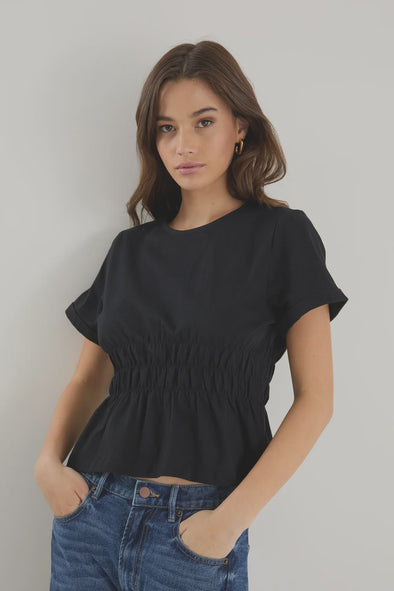 Classic crew neckline for timeless style

Short sleeves with rolled cuffs

Shirred waist detail for a flattering, tailored fit

Flared peplum-style hem for feminine movement

Made from soft, breathable 100% cotton