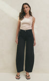 100% Cotton denim

Mid rise fit with a classic zip fly and button fastening

Barrel leg cut with gentle tapering at the hem

Slightly cropped length for a modern look

Washed black finish that softens beautifully over time

Designed true to size—size up if between sizes
