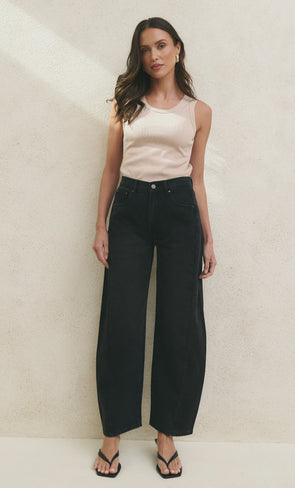 100% Cotton denim

Mid rise fit with a classic zip fly and button fastening

Barrel leg cut with gentle tapering at the hem

Slightly cropped length for a modern look

Washed black finish that softens beautifully over time

Designed true to size—size up if between sizes