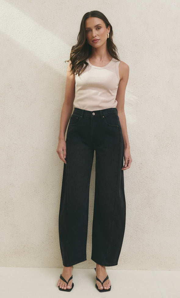 100% Cotton denim

Mid rise fit with a classic zip fly and button fastening

Barrel leg cut with gentle tapering at the hem

Slightly cropped length for a modern look

Washed black finish that softens beautifully over time

Designed true to size—size up if between sizes