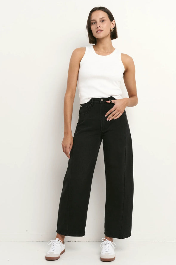 100% Cotton denim

Mid rise fit with a classic zip fly and button fastening

Barrel leg cut with gentle tapering at the hem

Slightly cropped length for a modern look

Washed black finish that softens beautifully over time

Designed true to size—size up if between sizes