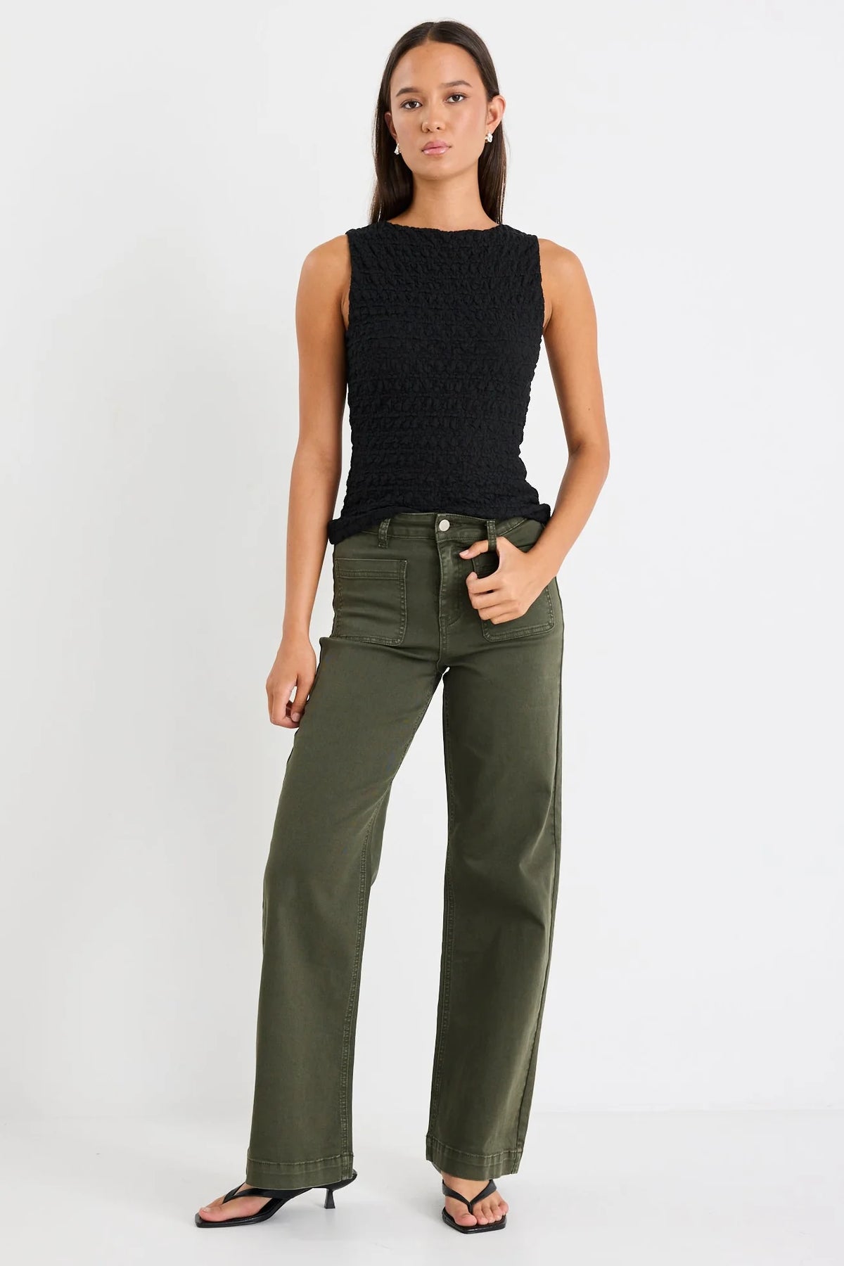 Flattering high-rise fit that cinches the waist

Wide leg silhouette for an effortlessly cool look

Soft stretch denim for all-day comfort

Functional front pockets

Easy-to-style dark khaki colour

Zip fly with fixed waistband

Fabric: 98% Cotton, 2% Elastane