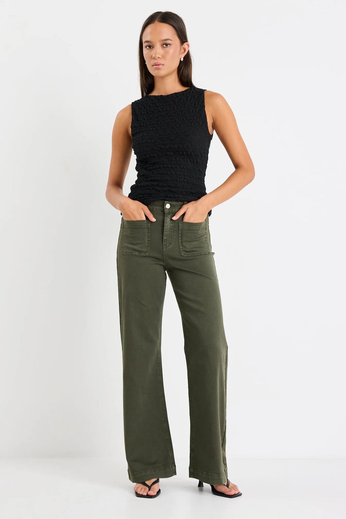 Flattering high-rise fit that cinches the waist

Wide leg silhouette for an effortlessly cool look

Soft stretch denim for all-day comfort

Functional front pockets

Easy-to-style dark khaki colour

Zip fly with fixed waistband

Fabric: 98% Cotton, 2% Elastane
