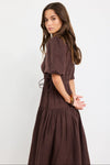 100% linen for breathable, natural comfort

Puff sleeves with soft volume for a feminine touch

Adjustable waist ties for a custom fit

Tiered skirt adds movement and flow

Midi length for timeless, versatile styling

Chocolate brown hue for an elegant, earthy look

Perfect for both casual wear and dressier occasions