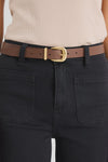 Elevate your everyday style with the sand leather belt from Among The Brave. Crafted from 3A grade leather, this versatile accessory features a sleek design complemented by a gold-tone buckle for a touch of sophistication. Perfect for cinching your favourite jeans or adding definition to dresses, this belt effortlessly enhances any outfit. Pair it with gold earrings to tie your look together!