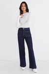 introducing the Zoey Jean, your new best friend for effortless style. This wide leg jean, features uniquely designed front pockets that add a touch of sophistication to your look. We love these indigo jeans as not only do they look great, but they feel great too.