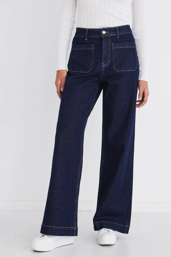 introducing the Zoey Jean, your new best friend for effortless style. This wide leg jean, features uniquely designed front pockets that add a touch of sophistication to your look. We love these indigo jeans as not only do they look great, but they feel great too.