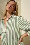 Experience easy elegance with this striped oversized shirt. Crafted from a soft, breathable cotton-linen blend, it feels as good as it looks. The roomy fit and playful balloon sleeves add a fun, carefree vibe that’s perfect for pairing with tailored trousers or your favorite denim. Refresh your high-low dressing game with this effortlessly cool staple.