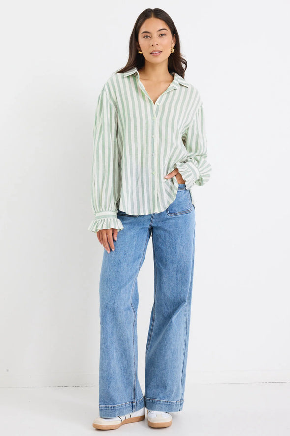 Experience easy elegance with this striped oversized shirt. Crafted from a soft, breathable cotton-linen blend, it feels as good as it looks. The roomy fit and playful balloon sleeves add a fun, carefree vibe that’s perfect for pairing with tailored trousers or your favorite denim. Refresh your high-low dressing game with this effortlessly cool staple.