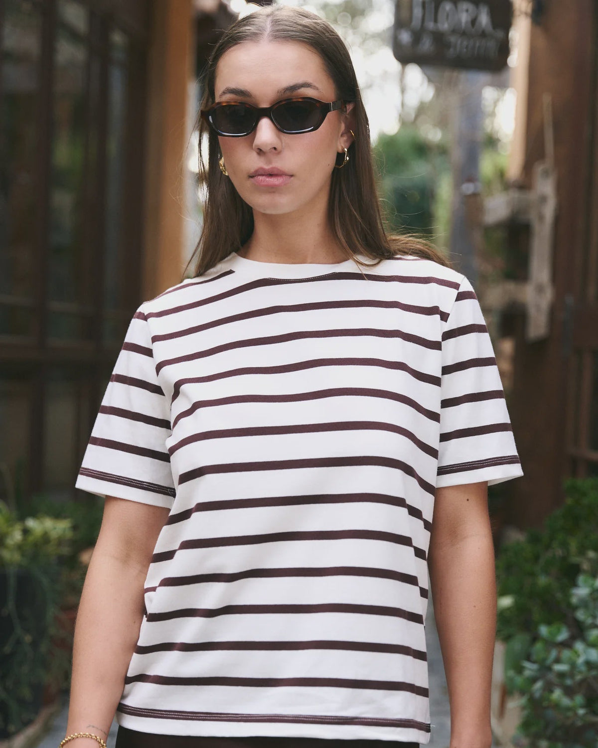 Key Features

Brown and white stripe design

Oversized boxy fit for a modern silhouette

Short sleeve

Fabric Composition - 100% Cotton