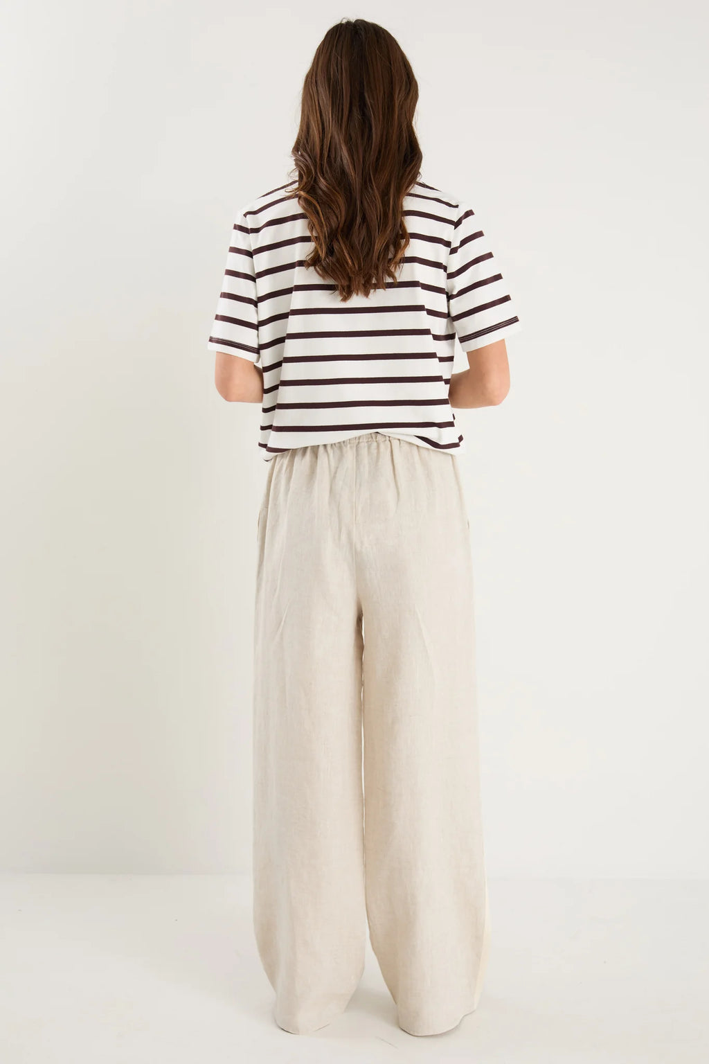 Key Features

Brown and white stripe design

Oversized boxy fit for a modern silhouette

Short sleeve

Fabric Composition - 100% Cotton