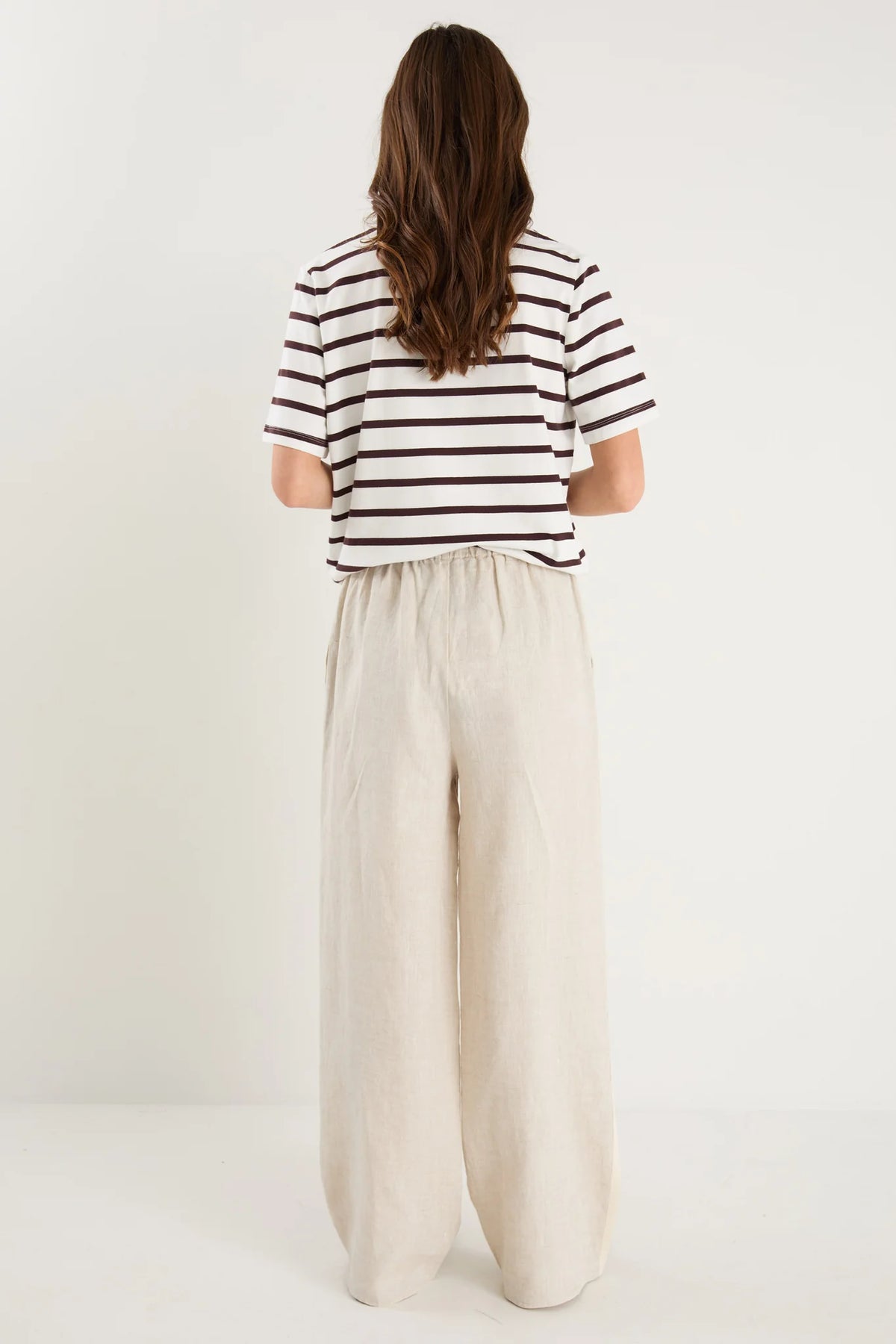 Key Features

Brown and white stripe design

Oversized boxy fit for a modern silhouette

Short sleeve

Fabric Composition - 100% Cotton