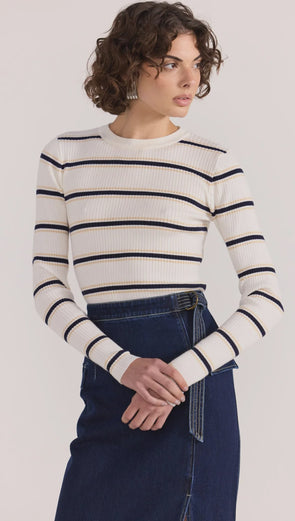 - Ribbed knit texture for structure and stretch
- Classic crew neckline and long sleeves
- Slim fit for easy layering
- Timeless navy and sand stripe on ivory base