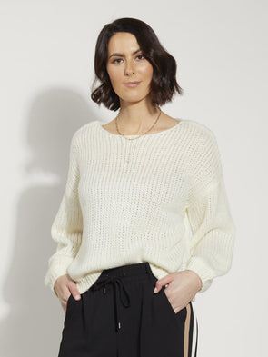 the Fee Jumper from Drama the Label's exquisite knitwear collection. This slightly oversized crew neck jumper boasts bellow sleeves