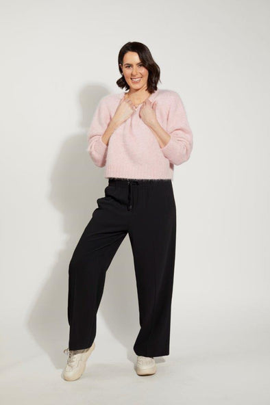  Lottie Jumper from Drama the Label's knitwear collection,&nbsp; available in the captivating shade of pink Coconut Ice. This super fluffy garment boasts a comfortable crew neck, long sleeves, 