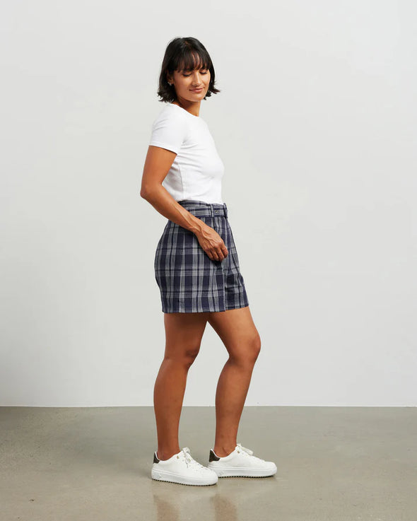 Fresh and summery in ink and white cotton blend plaid, these cute shorts with front pleat detail and self belt are a must have. &nbsp;Style with a tank top or t-shirt for the beach or with the Kennedy Blazer in the matching fabric for an elevated summer 'suit' option.&nbsp;

COLOUR
Ink Plaid

FABRIC INFO
80% Cotton 20% Poly