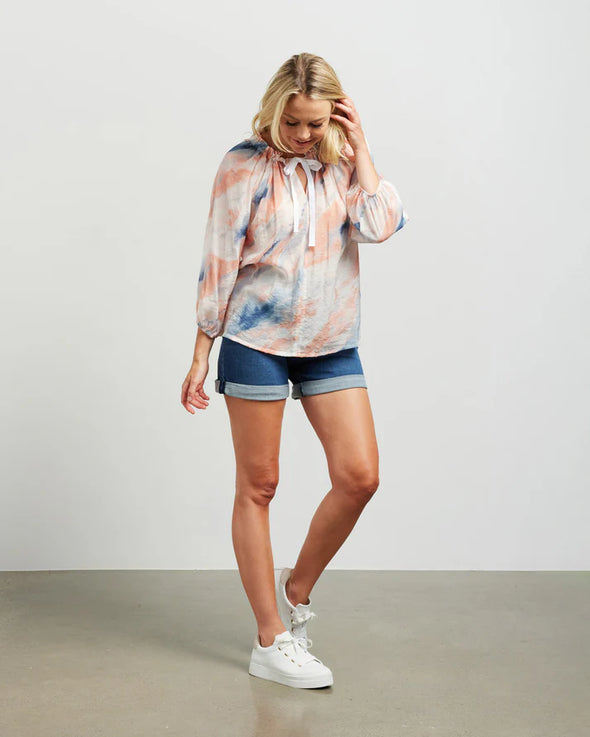 Embrace effortless beauty in our pretty Talia top. It showcases a gather tie neck detail, 3/4 length raglan sleeves that gather into narrow cuffs, and a relaxed fit. Made in a delicate rayon blend print, it exudes femininity and charm, perfect for adding a touch of whimsy to your summer wardrobe.

COLOUR
Sunset Print

FABRIC INFO
85% Rayon 15% Nylon