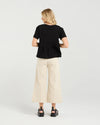 Soft cotton blend tee with stretch for comfort
Flattering round neckline and sleeve length
Front darting detail for a chic, tailored finish
Easy to style with denim, skirts, or shorts
95% Cotton, 5% Spandex
