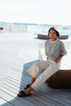 Best-selling easy fit top updated in a check print

Contrast striped rib neck and cuffs for a luxe finish

Playful monochrome design for versatile styling

Crafted from a comfortable 94% Polyester, 6% Spandex blend

A wardrobe must-have for easy, everyday chic