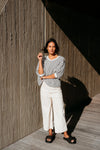 Best-selling easy fit top updated in a check print

Contrast striped rib neck and cuffs for a luxe finish

Playful monochrome design for versatile styling

Crafted from a comfortable 94% Polyester, 6% Spandex blend

A wardrobe must-have for easy, everyday chic