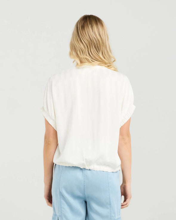 Playful elasticated sleeves with a feminine touch

Adjustable drawstring waist for a flattering fit

Lightweight 48% Viscose, 52% Rayon with a soft sheen

Easy to dress up or down for smart casual styling

A versatile wardrobe must-have for spring and summer