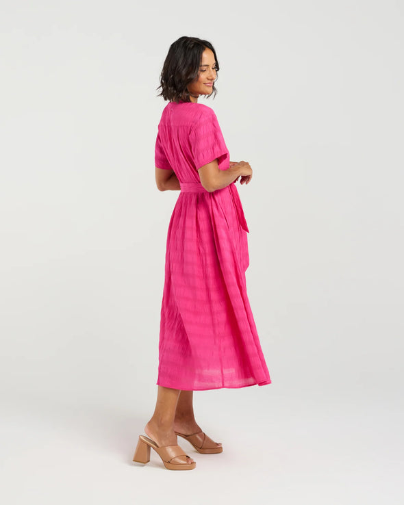 Feminine cap sleeves with a relaxed fit
Button-down front for versatile styling
Curved bodice panels for subtle shape
Self-tie waist to cinch and flatter
Soft and lightweight
70% Rayon, 30% Nylon blend