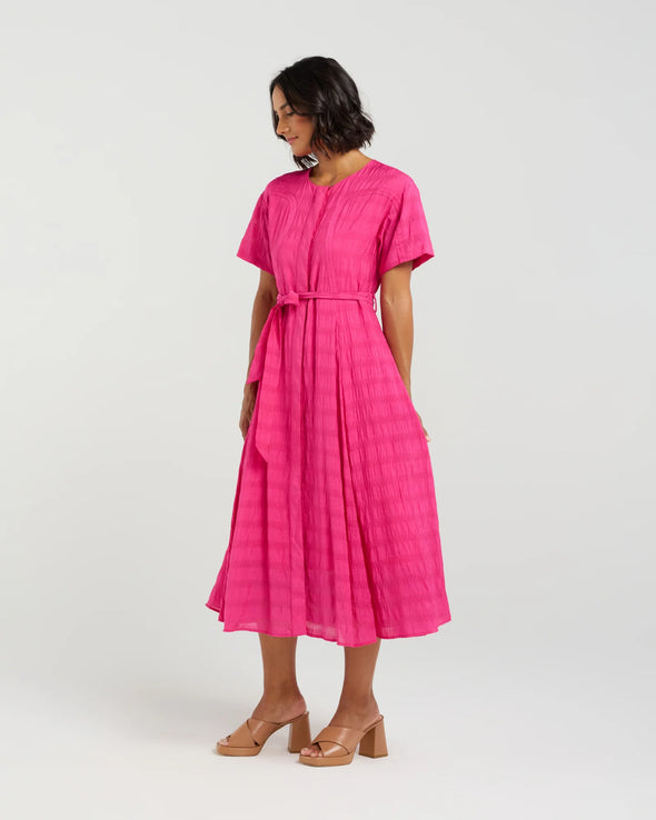 Feminine cap sleeves with a relaxed fit
Button-down front for versatile styling
Curved bodice panels for subtle shape
Self-tie waist to cinch and flatter
Soft and lightweight
70% Rayon, 30% Nylon blend