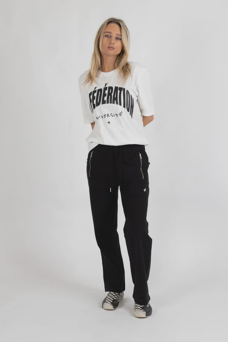 Straight-leg fit that falls cleanly from the hip

Flattering curved back panel

Secure zip pockets with silver hardware

Eyelet detailing for a refined finish

Soft and stretchy 95% cotton, 5% elastane fabric

Easy to style up or down for everyday wear